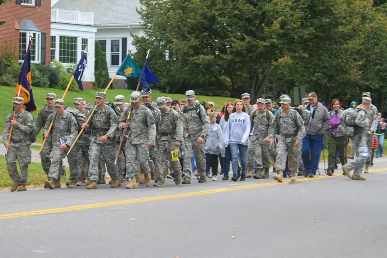 A column of Maine service members marching at the 2013 Maine Marathon in Portland